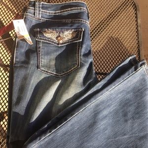 inc curvy fit boot leg jeans